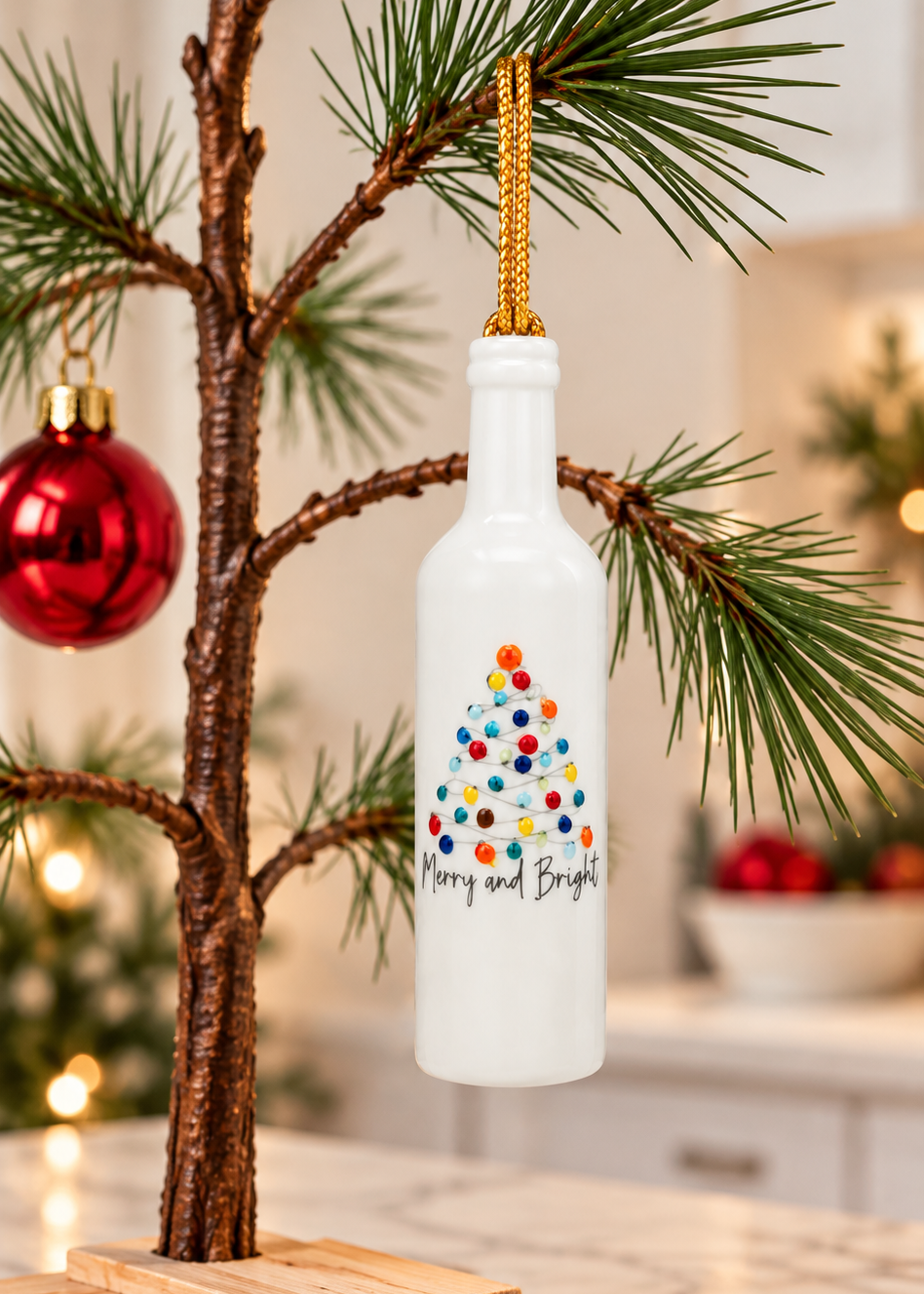 White Porcelain 3.25" Wine Bottle Ornament with a hand-painted Christmas Tree