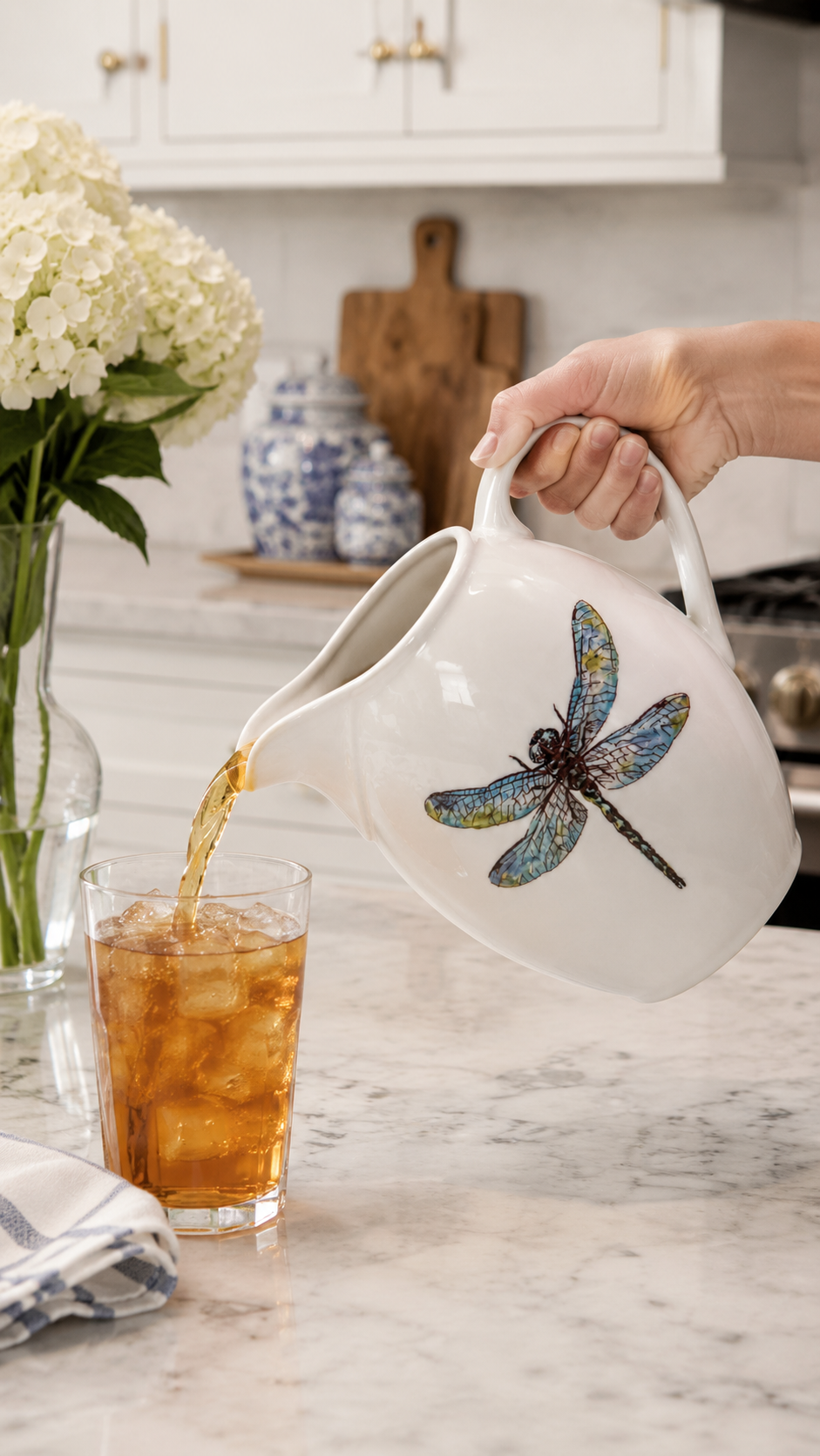 Hand-Painted Dragonfly Porcelain Pitcher – Serving Fresh Iced Tea in a Bright Kitchen