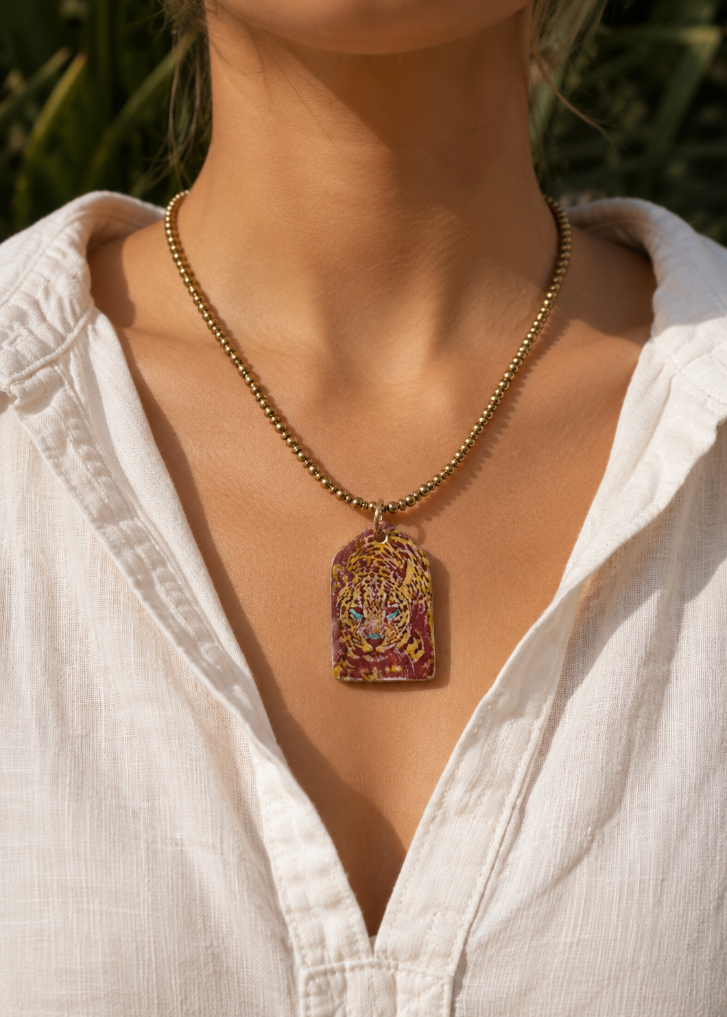 Maroon Jaguar Beaded Pendant Necklace