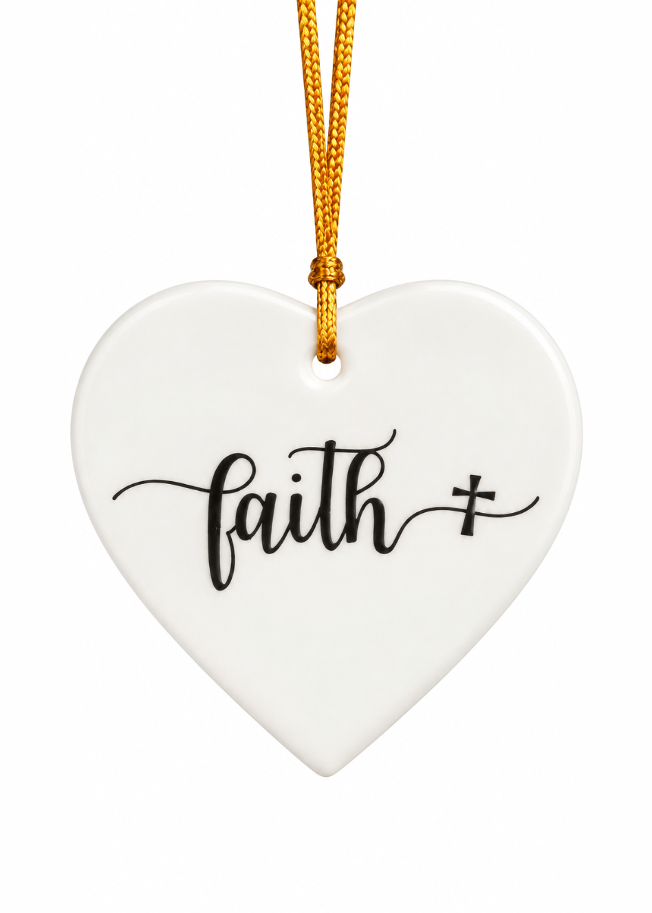 White porcelain heart ornament hand-painted with the word Faith in black script and a cross