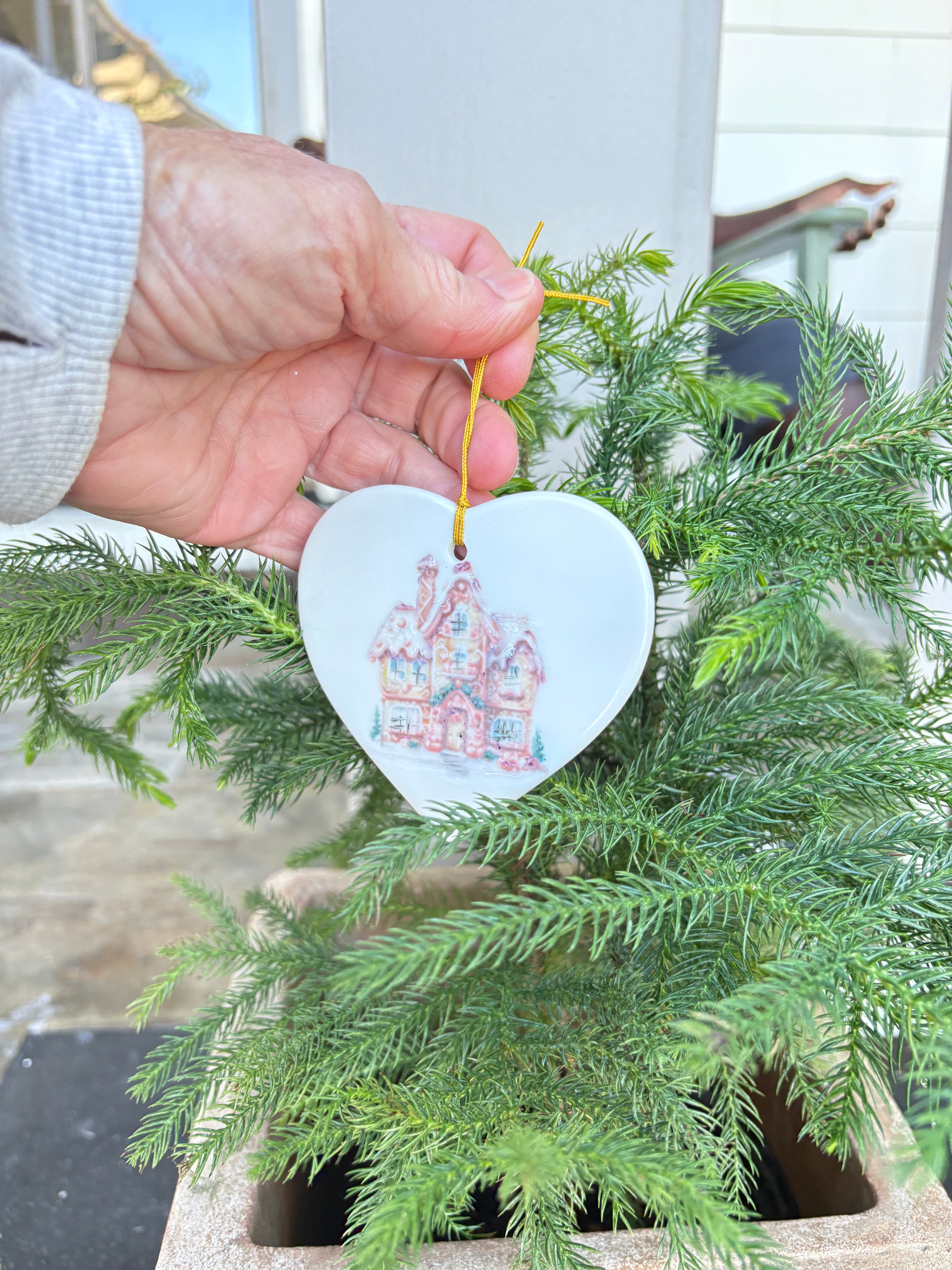 Hand painted gingerbread house on a white heart porcelain ornament 3.5"