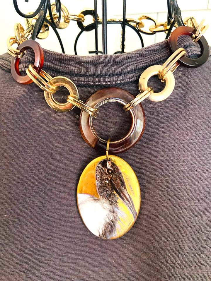 Bird Pendant Necklace with a bird coastal pendant tortoise shell gold necklace