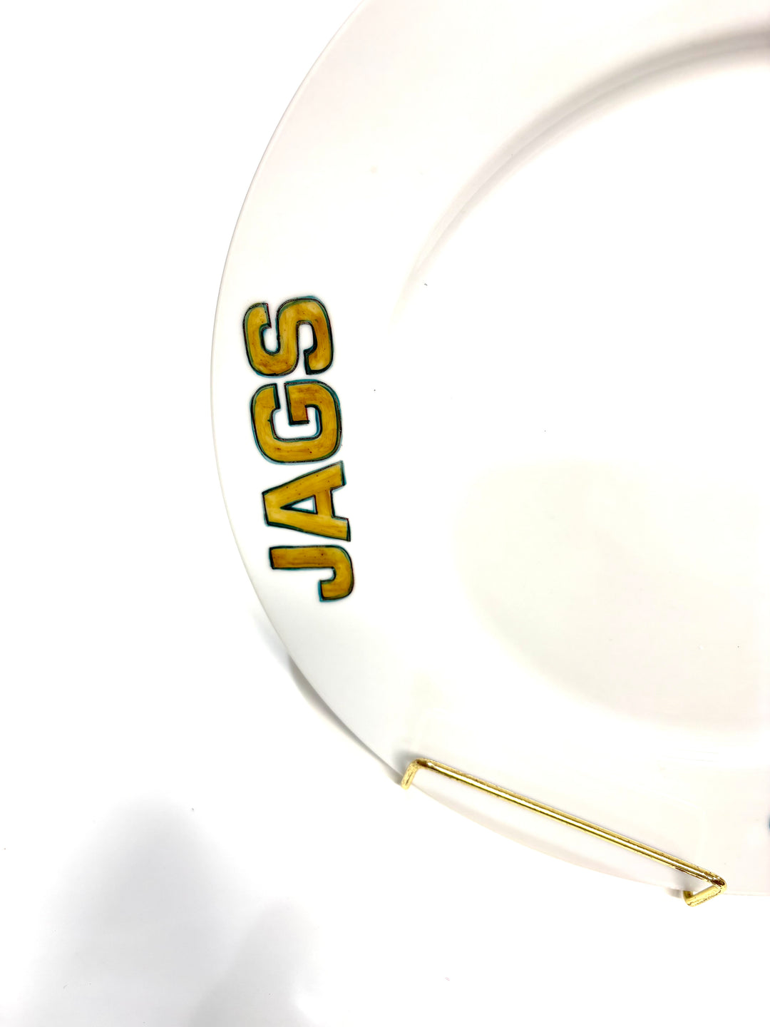 White Porcelain Plate with the words JAGS