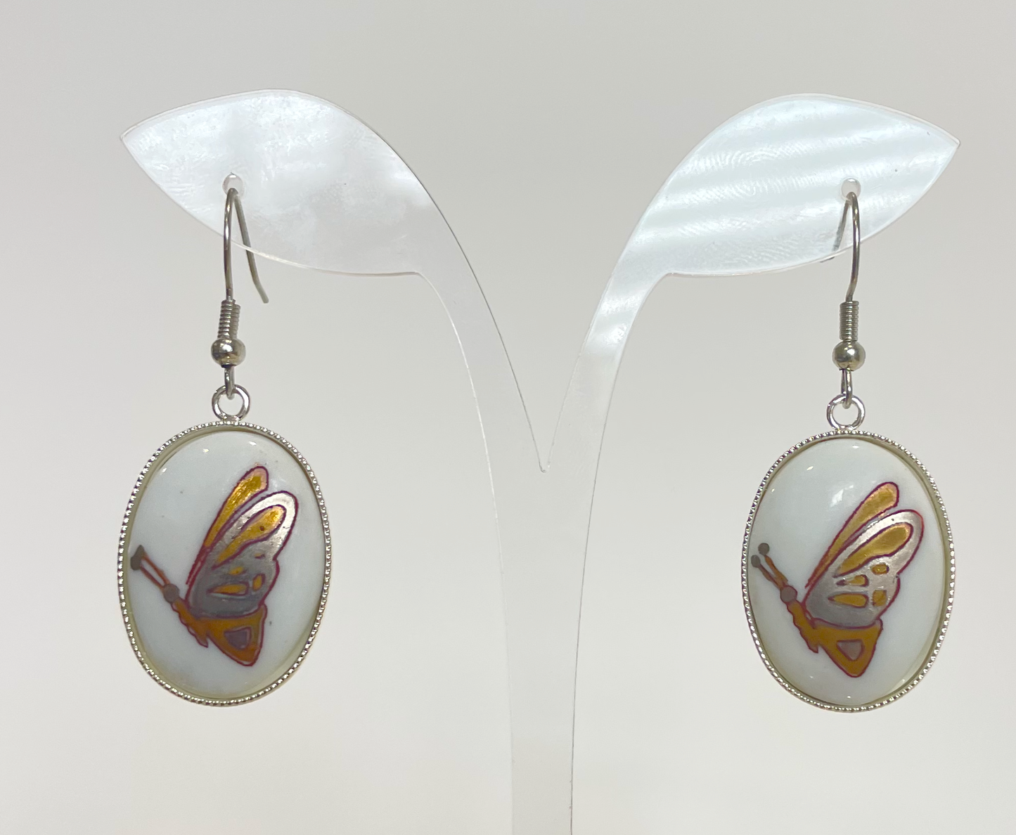 butterfly earrings with silver outline