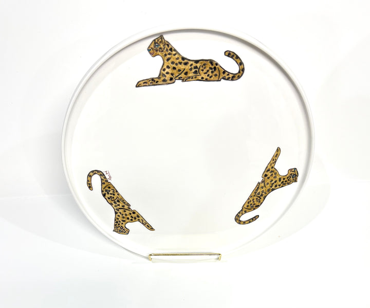 white round porcelain platter with three Jaguars