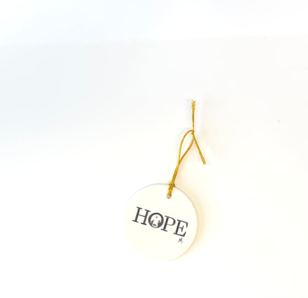 White round 2.75" porcelain ornament with the wording Hope