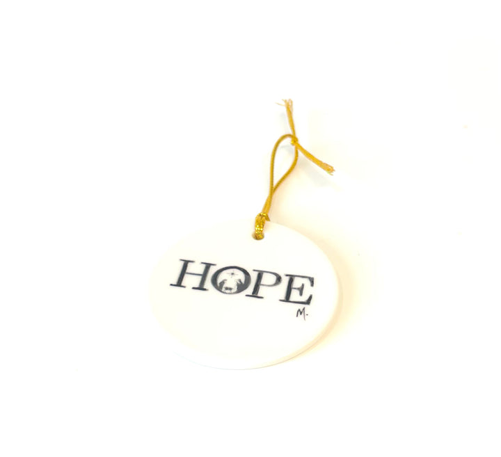 White round 2.75" porcelain ornament with the wording Hope