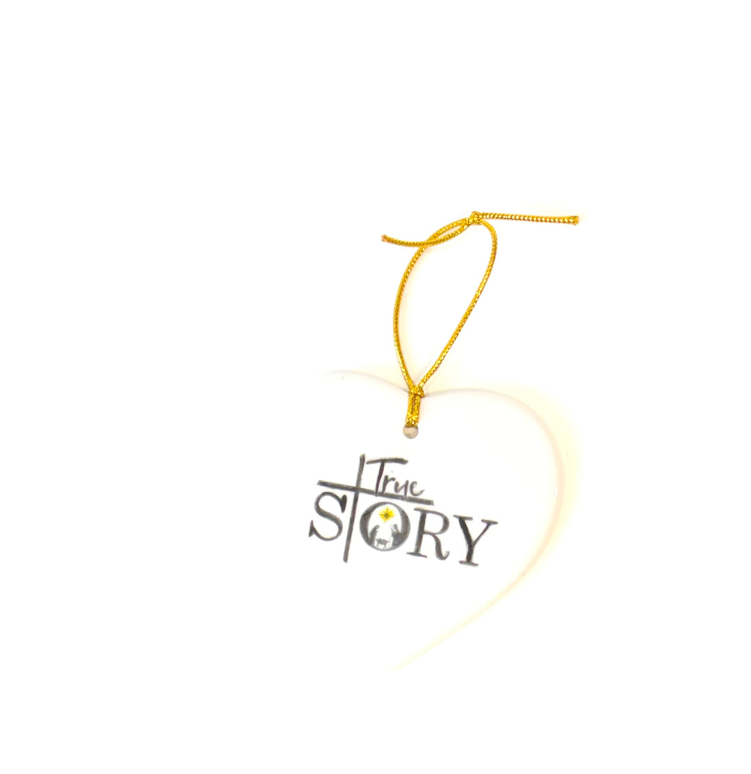 White Heart Porcelain Ornament – “True Story” with Manger Scene, 3.25”