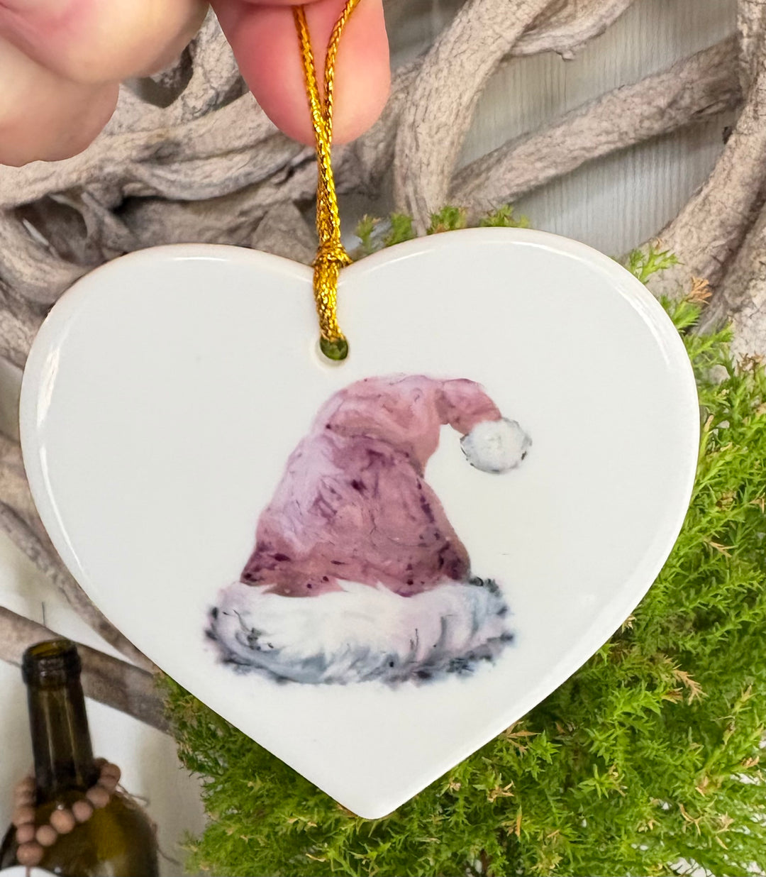 3.5" White Porcelain Heart Ornament with a hand painted Santa Hat