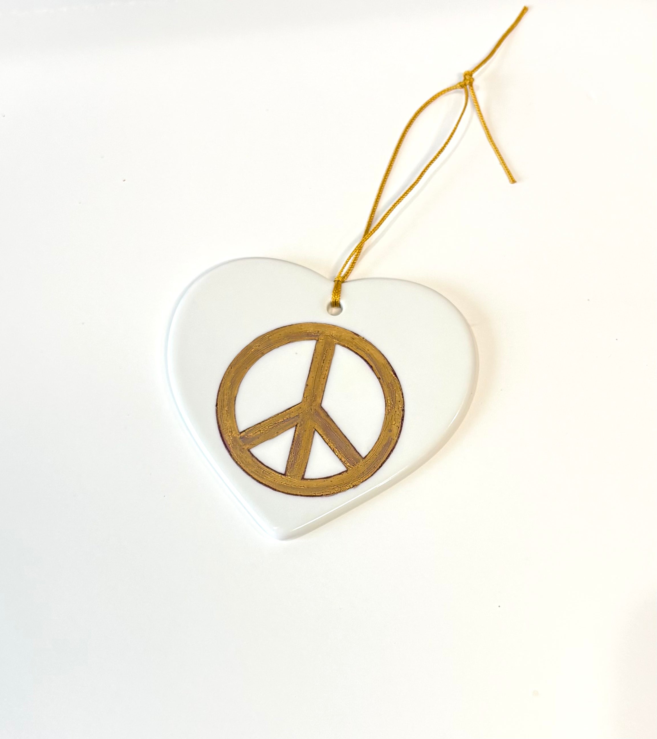 White Porcelain Heart Ornament with Gold Peace Sign