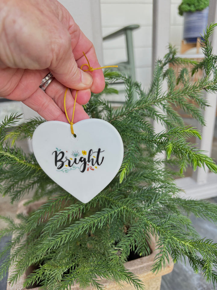 White Porcelain Heart 3.5" Ornament with the word Bright