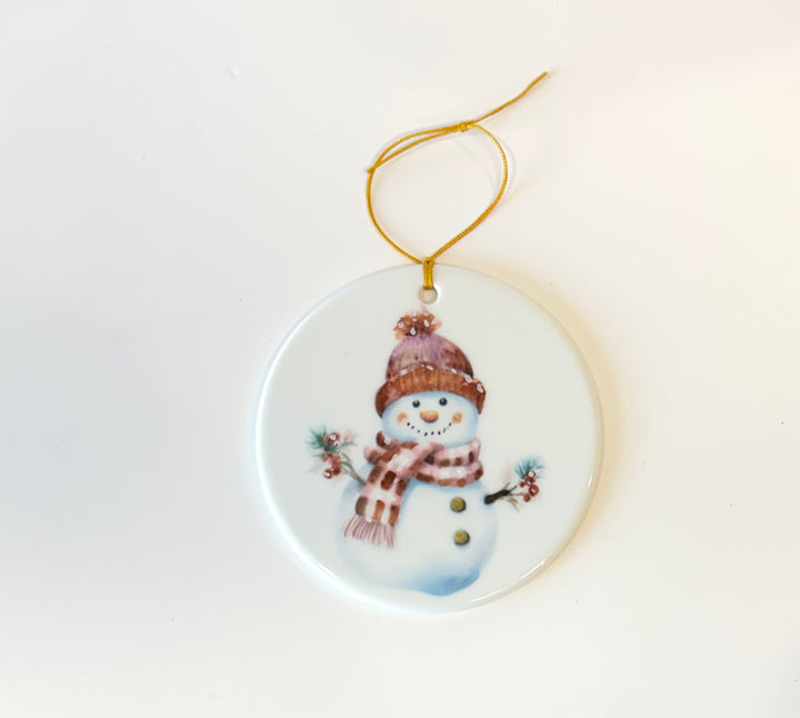 Large White Porcelain 3.75" ornament with a hand painted snowman