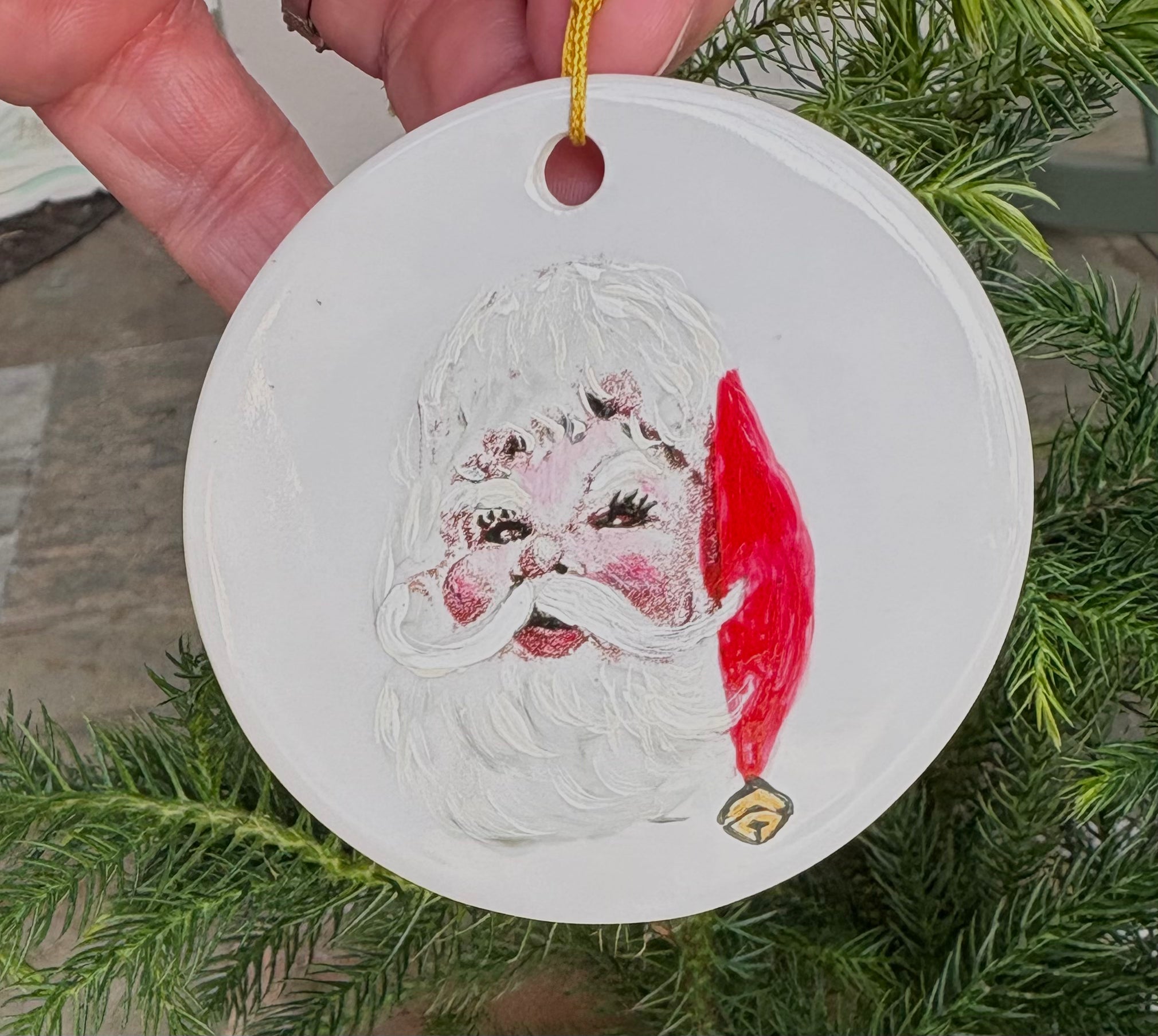 White Porcelain 2.75" Round Ornament With A Santa Face