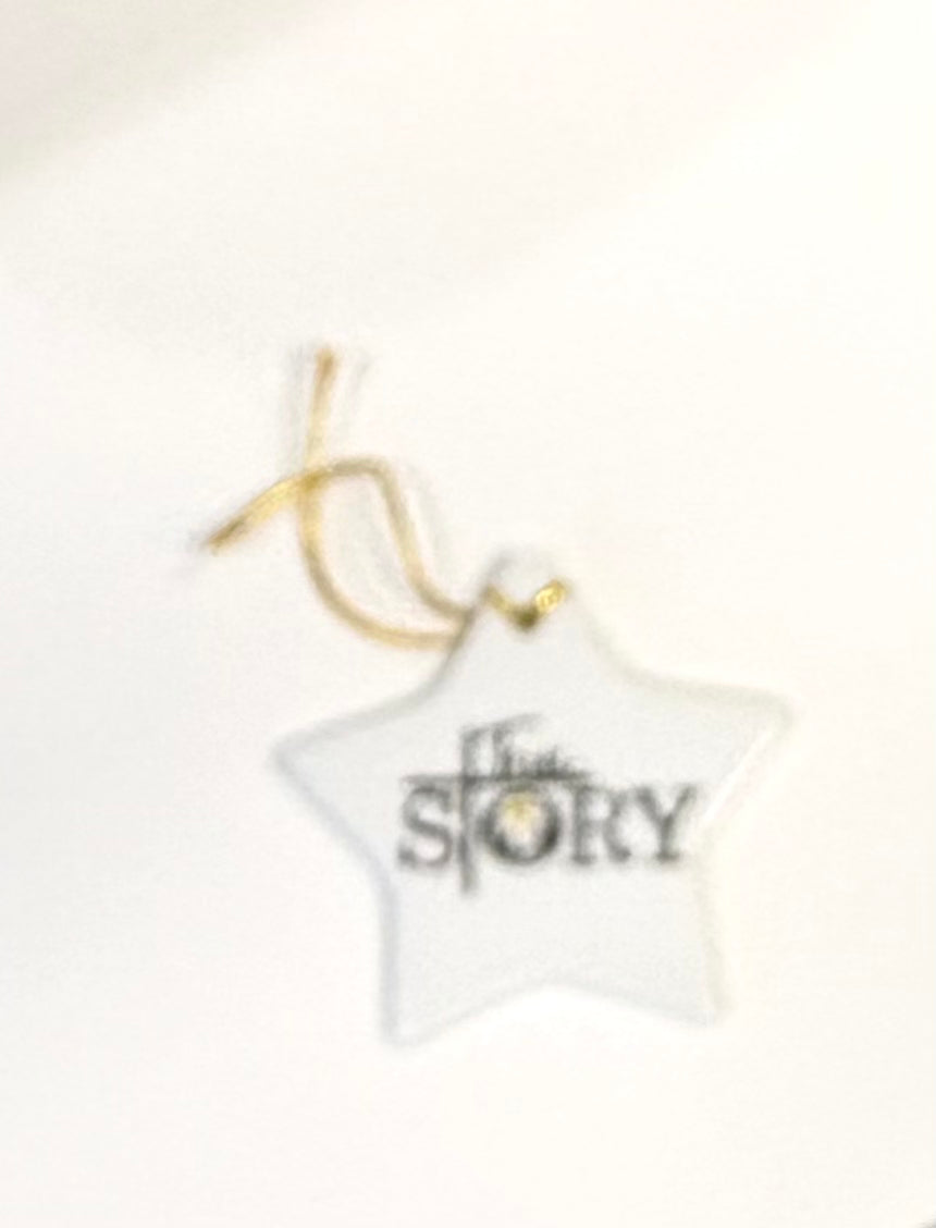 White Porcelain 2.5" Star Ornament With The Wording True Story