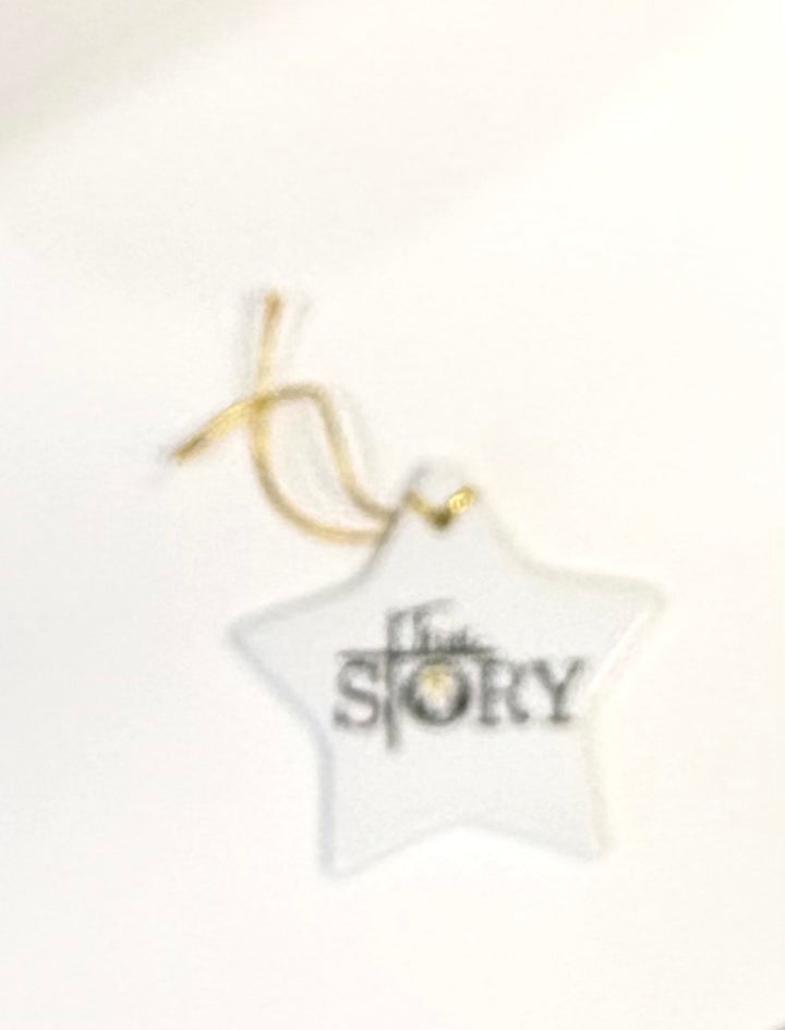 White Porcelain 2.5" Star Ornament With The Wording True Story