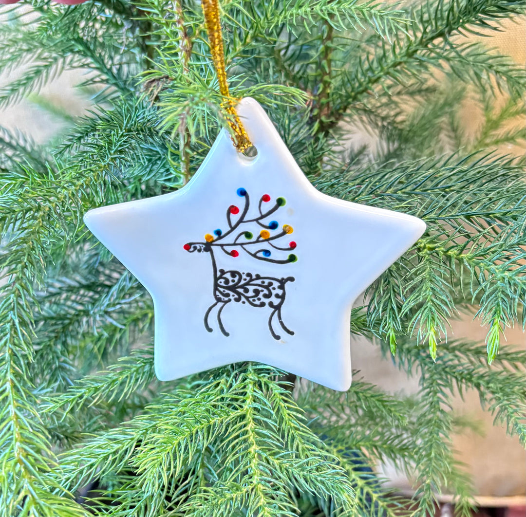 White Porcelain Star Ornament with Hand-Painted Reindeer (3.5")