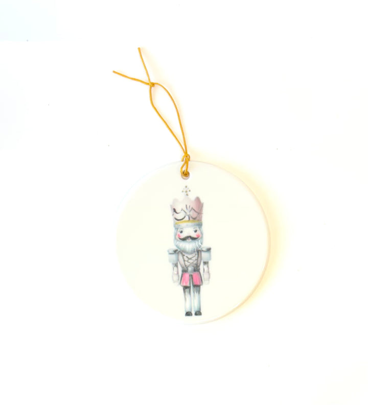 White Porcelain Ornament 3.75" with a hand painted nutcracker