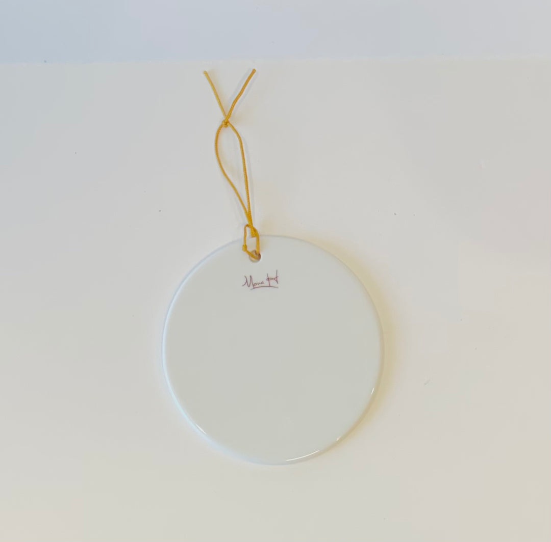 White Porcelain Ornament 3.75" with a hand painted nutcracker