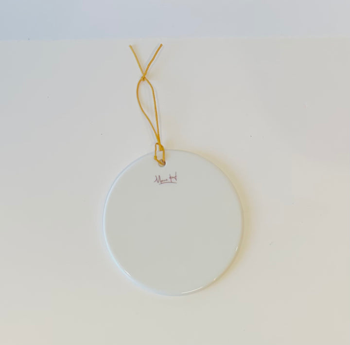 White Porcelain Ornament 3.75" with a hand painted nutcracker