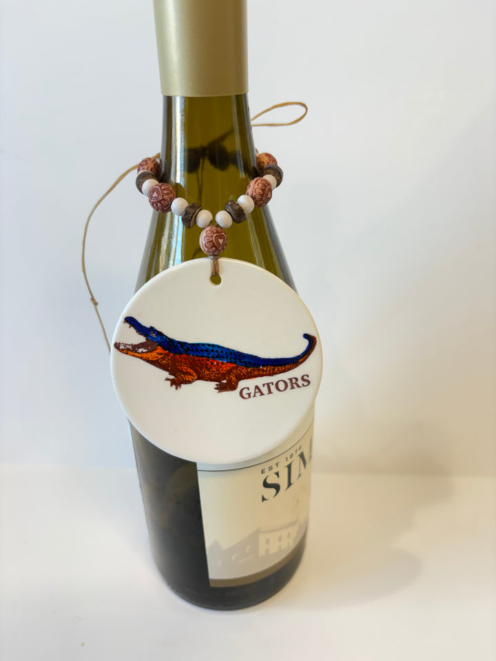 White Porcelain 3" Round Disk with a hand painted Orange and Blue Gator