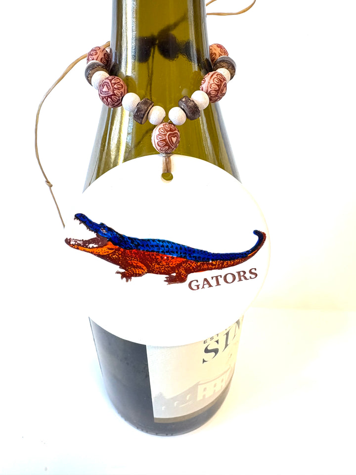 White Porcelain 3" Round Disk with a hand painted Orange and Blue Gator