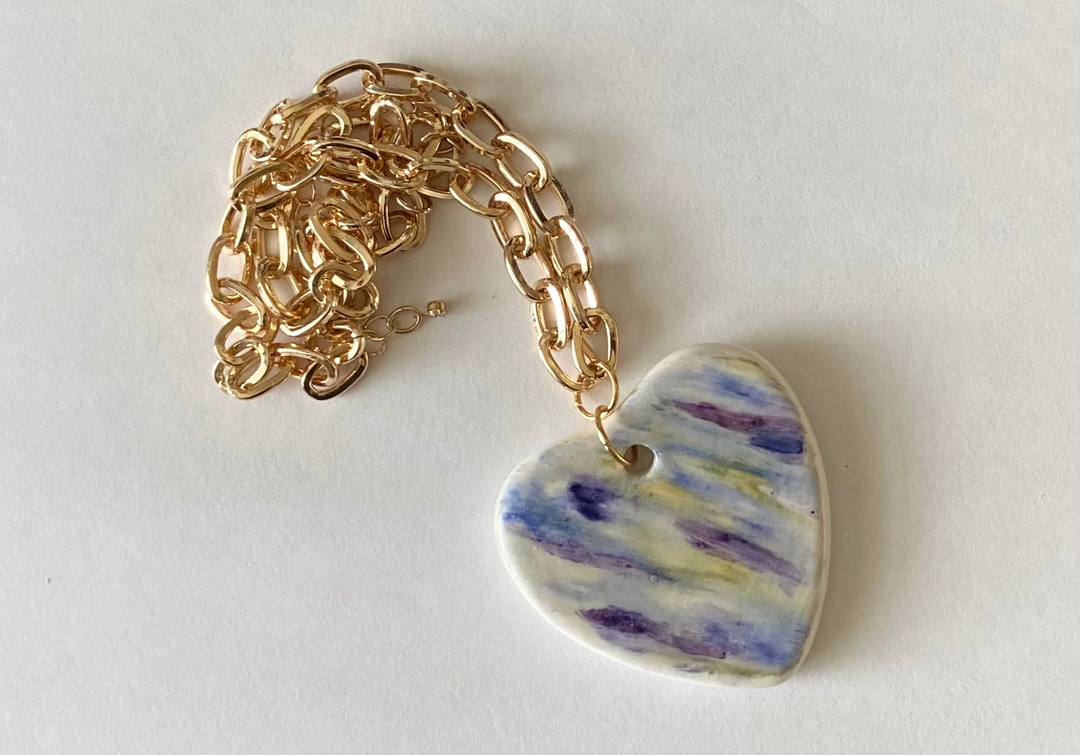 Heart rainbow pendant on a gold filled chain