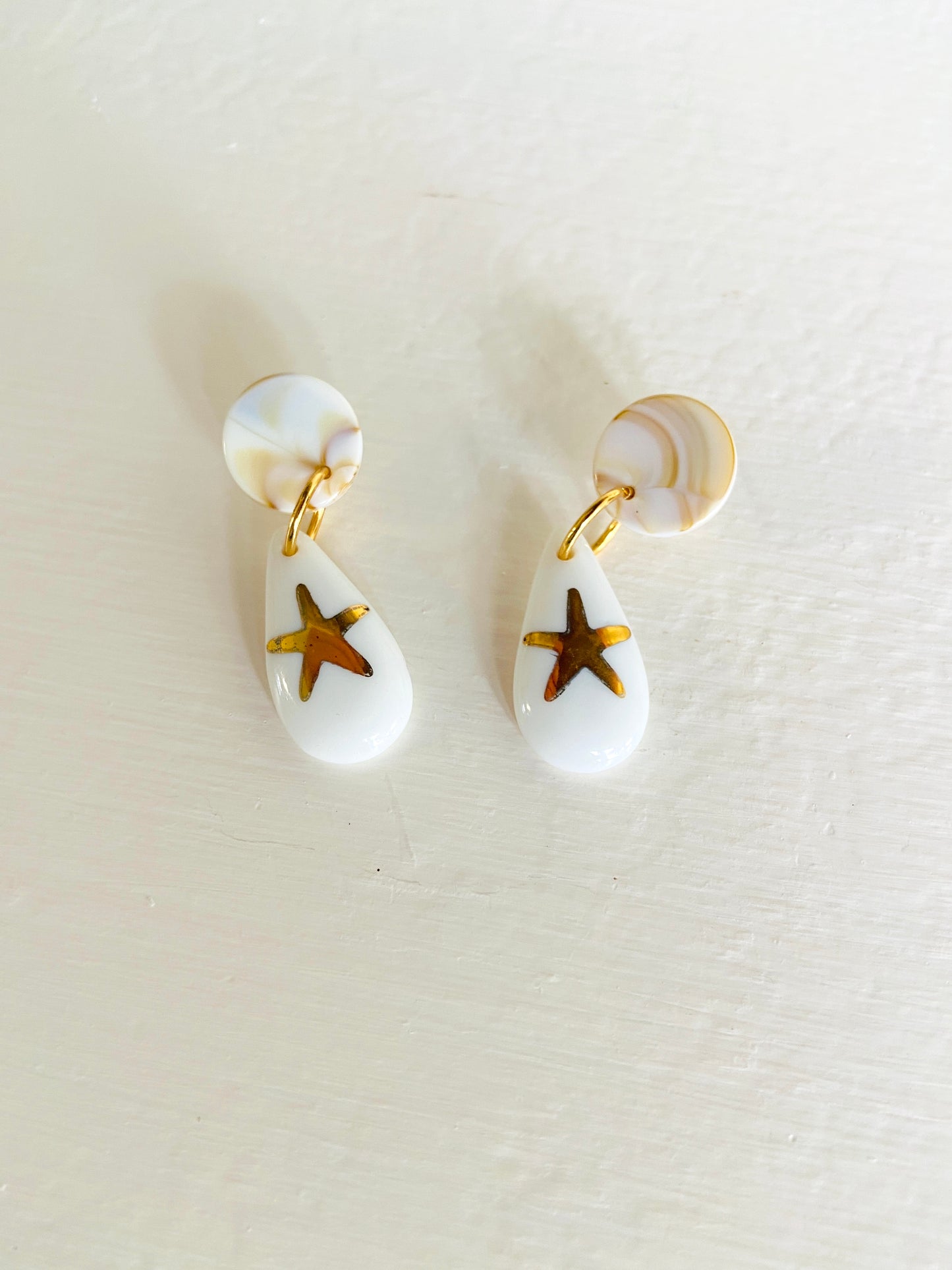 star earrings gold star teardrop shape