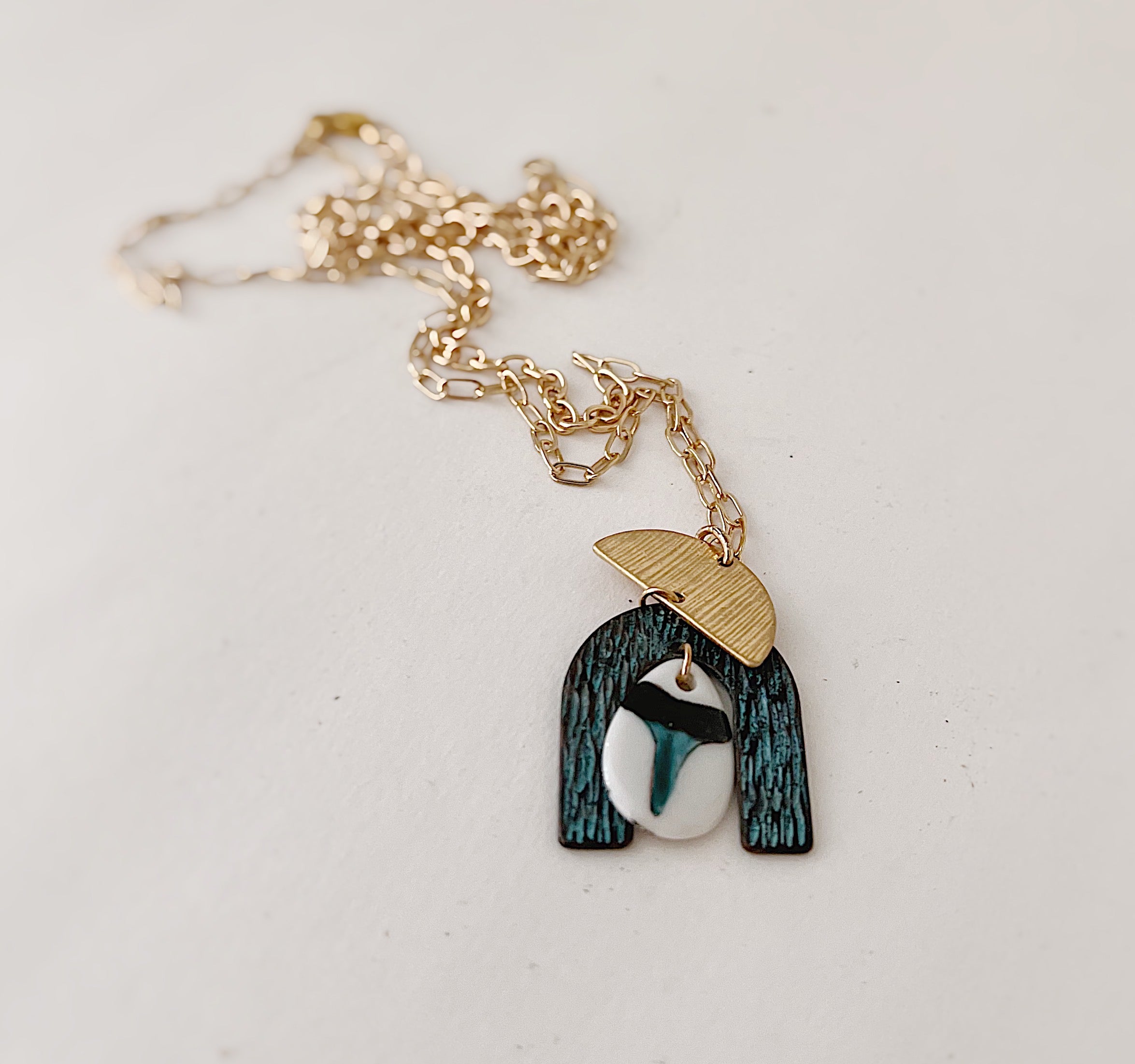 Coastal Necklace with a small shark tooth pendant
