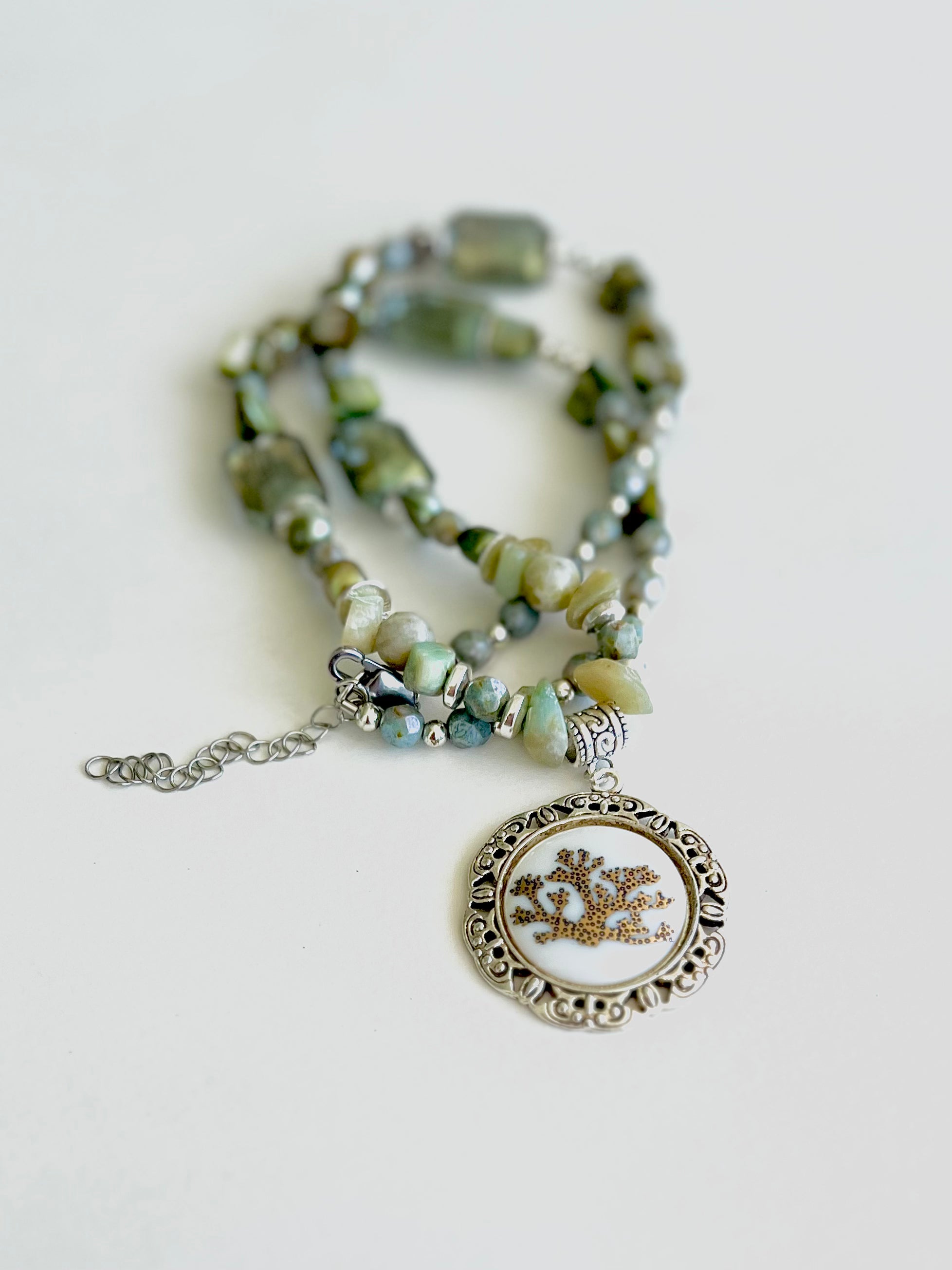 A gift, gift for that coral lover, bezel with a coral ceramic pendant, green Beaded Necklace